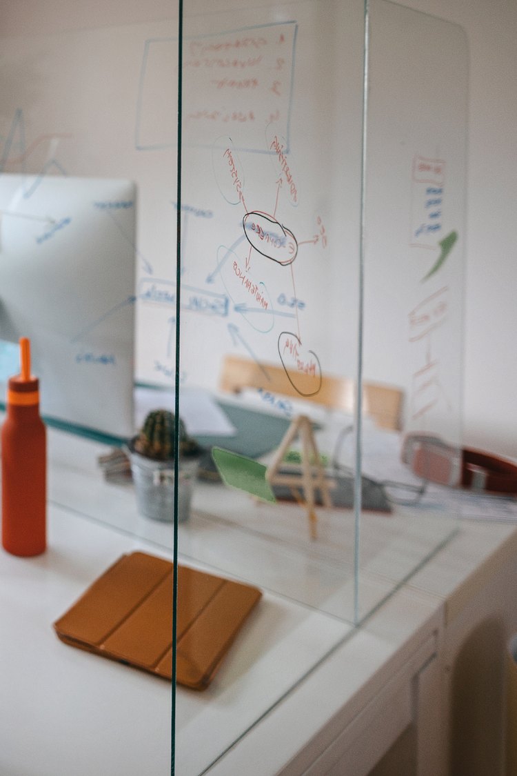 Clear glass partition wall in an office
