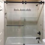 Glass shower door installed by DeSola Glass