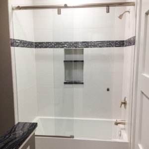 Glass shower door installed by DeSola Glass
