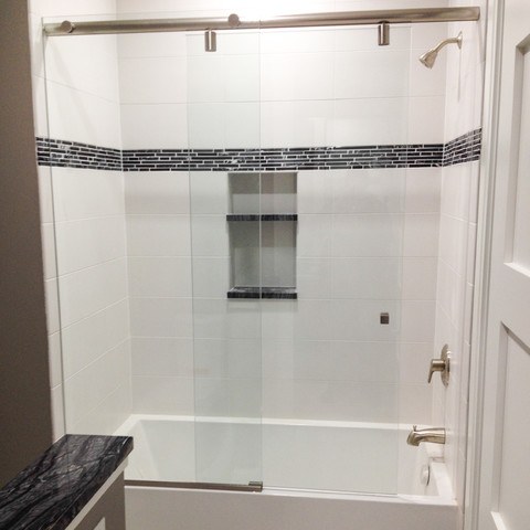Glass shower door installed by DeSola Glass
