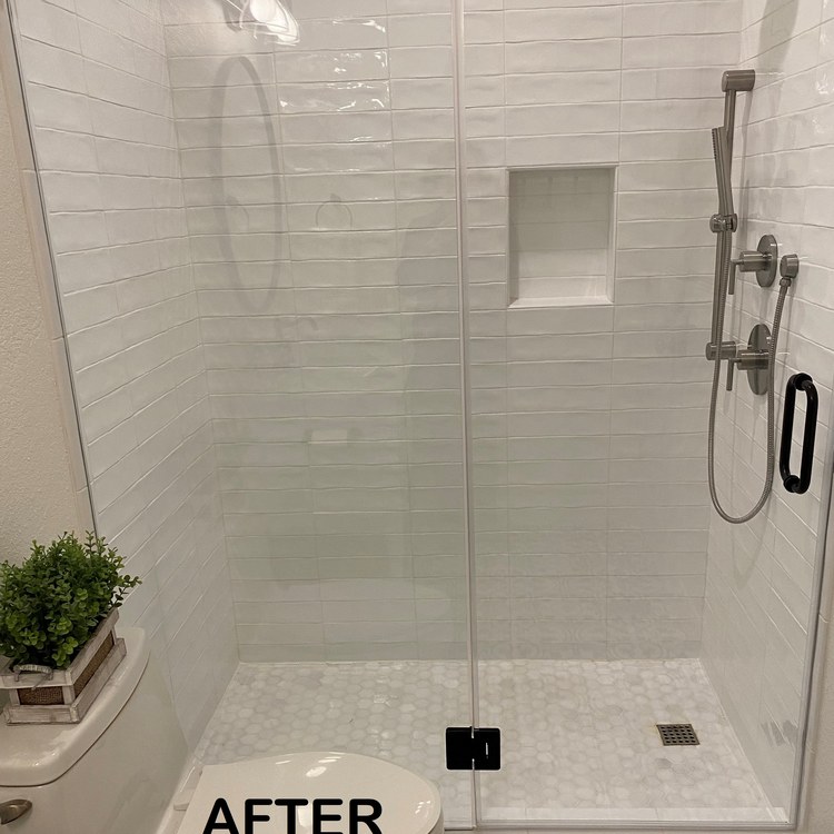 Glass shower door installed by DeSola Glass