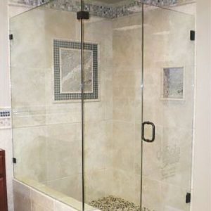 Glass shower door installed by DeSola Glass