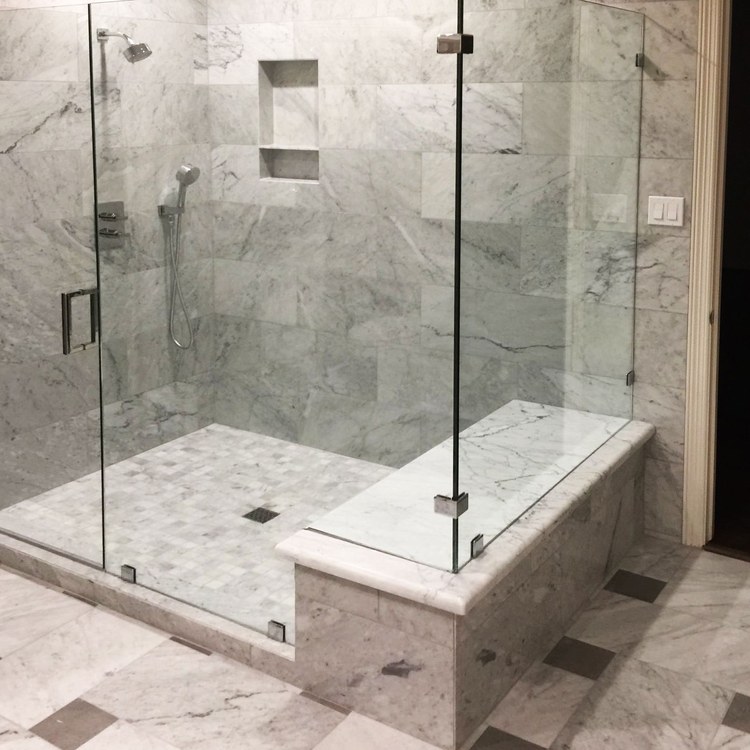 Glass shower door installed by DeSola Glass