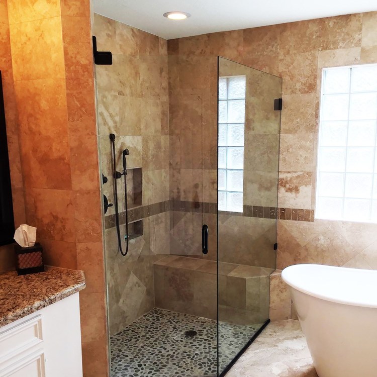Glass shower door installed by DeSola Glass